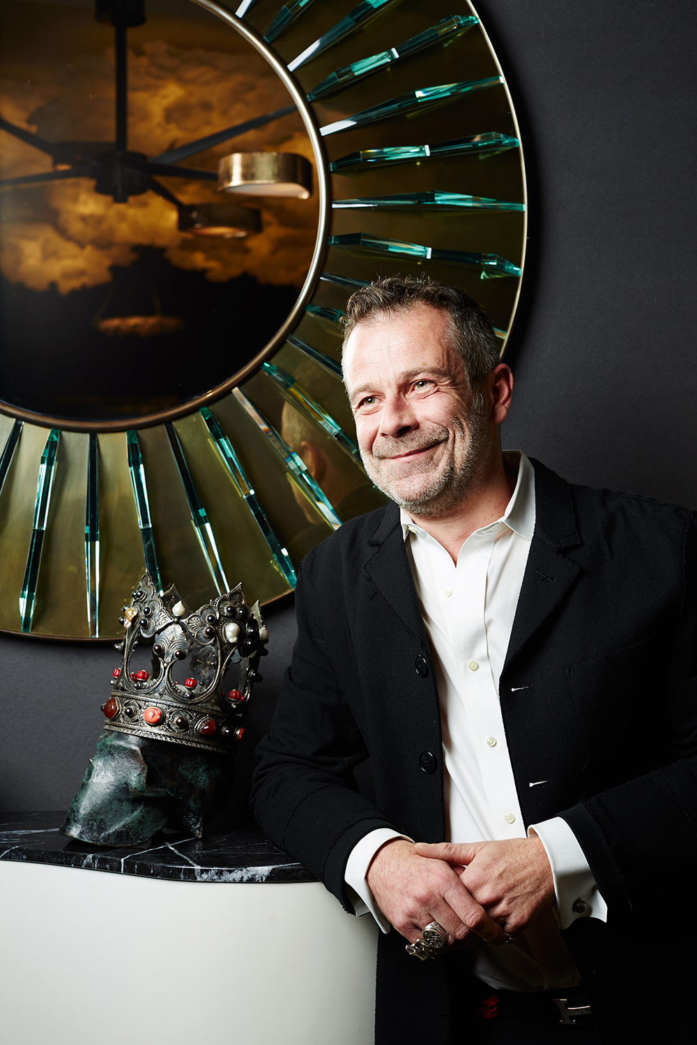 Benoist Drut, interior designer and partner with Mason Gerard gallery inside of his booth, Salon Art + Design Fair at the Park Avenue Armory, New York, New York, November 11th, 2016. Yvonne Albinowski/For New York Observer