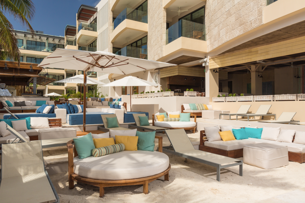 Beachfront daybeds at The Thompson Beach House