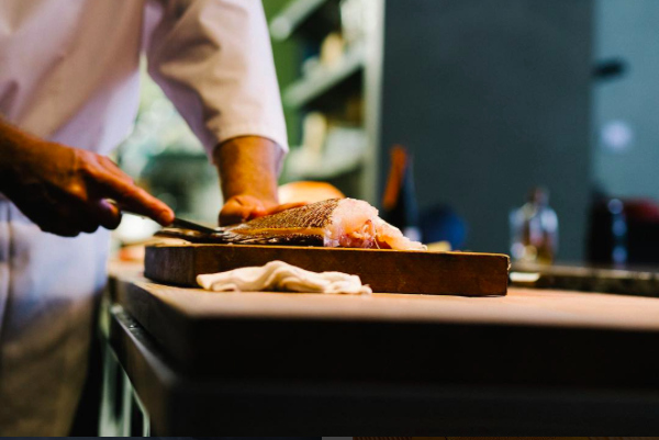 Breaking down Japanese sea bream for sashimi