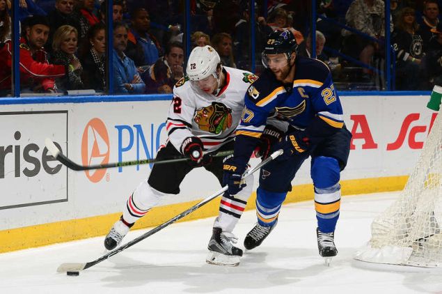 Alex Pietrangelo of the St. Louis Blues and Artemi Panarin of the Chicago Blackhawks.