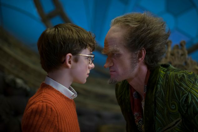 Louis Hynes as  Klaus Baudelaire and Neil Patrick Harris as Count Olaf in A Series of Unfortunate Events. 