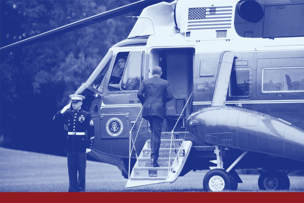 WASHINGTON, DC - OCTOBER 4: U.S. President Barack (R) Obama boards Marine One on the South Lawn prior to his departure from the White House October 4, 2015 in Washington, DC. Obama is speaking at the 34th National Fallen Firefighters Memorial Service in Emmitsburg, Maryland. (Photo by Olivier Douliery-Pool/Getty Images)