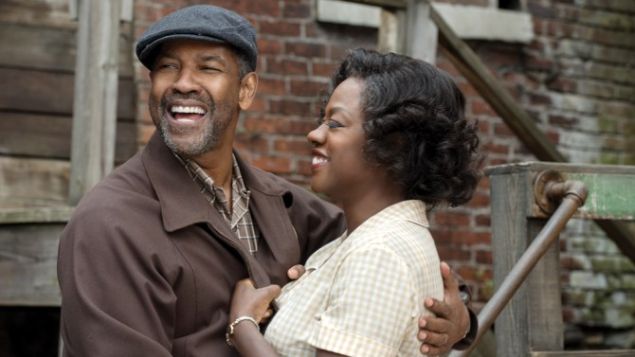 Denzel Washington as Troy Maxson and Viola Davis as Rose Maxson.