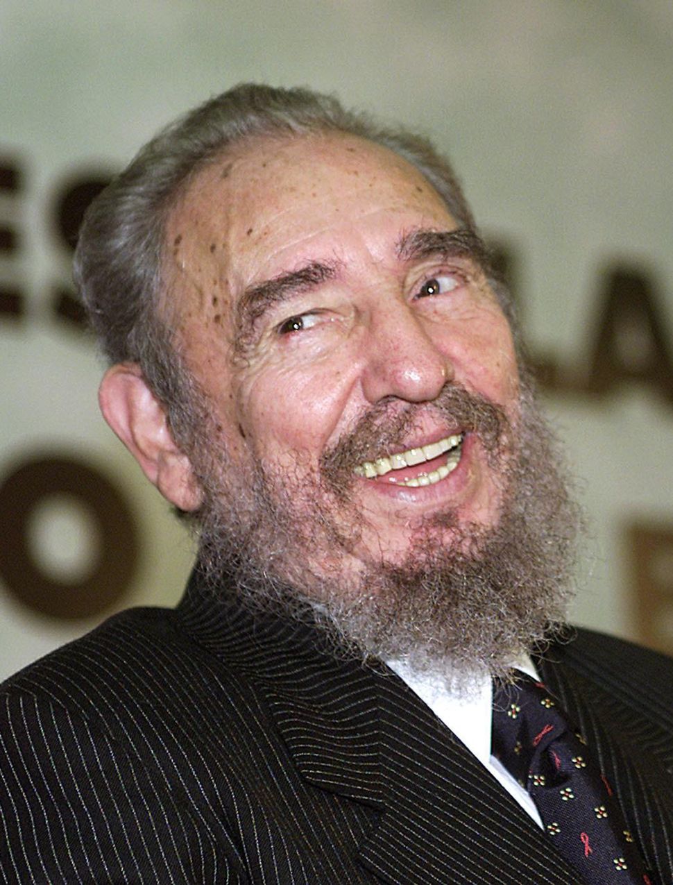 Fidel Castro having a great time in 2003 at the Ministry of Education in Brazil.