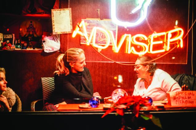 Two girlfriends at a fortune teller in Greenwich Village.