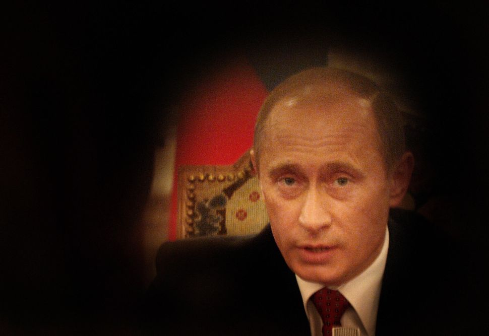 Prague, CZECH REPUBLIC: Russian President Vladimir Putin speaks at a joint press conference alongside his Czech counterpart President Vaclav Klaus 01 March 2006, at Prague's Hradcany castle. Putin is on a two-day official visit to the Czech Republic. PHOTO AFP MICHAL CIZEK
