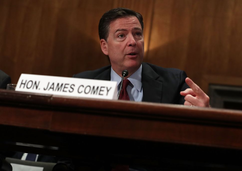 WASHINGTON, DC - SEPTEMBER 27: FBI Director James Comey testifies during a hearing before the Senate Homeland Security and Government Affairs Committee September 27, 2016 on Capitol Hill in Washington, DC. The committee held a hearing on "Fifteen Years After 9/11: Threats to the Homeland."