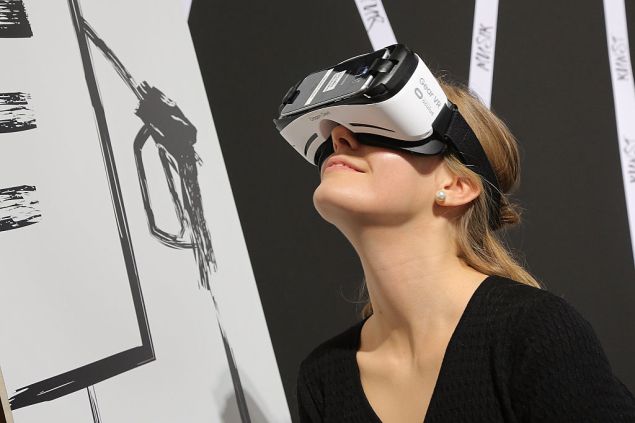 FRANKFURT AM MAIN, GERMANY - OCTOBER 20: A visitor experienced a fantastic world with VR glasses the 2016 Frankfurt Book Fair (Frankfurter Buchmesse) on October 20, 2016 in Frankfurt am Main, Germany. The 2016 fair, which is among the world's largest book fairs, will be open to the public from October 19-23. (Photo by Hannelore Foerster/Getty Images)