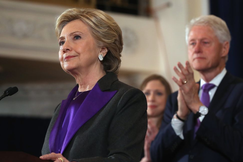 Former Secretary of State Hillary Clinton, accompanied by her husband former President Bill Clinton, concedes the presidential election at the New Yorker Hotel on November 9, 2016 in New York City. 