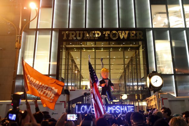 Hundreds of protestors rallying against Donald Trump gather outside of Trump Tower, November 9, 2016 in New York City.