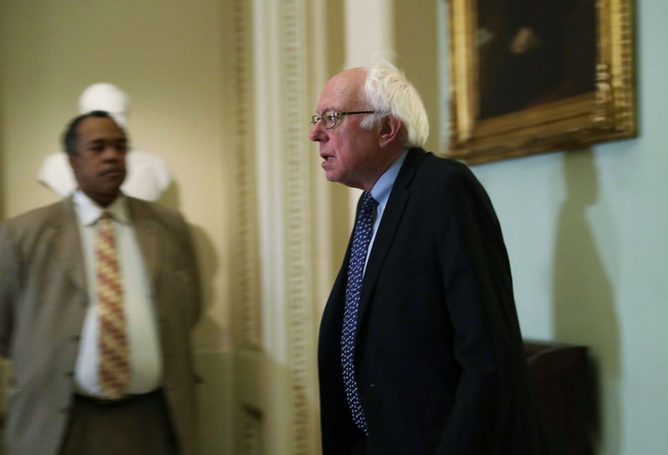 Sen. Bernie Sanders arrives at an election meeting of Senate Democrats at the Capitol November 16, 2016 in Washington, DC.