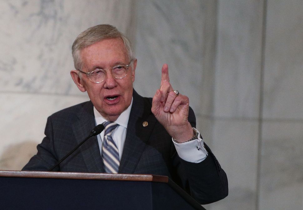 Senate Minority Leader Sen. Harry Reid speaks during his leadership portrait unveiling ceremony December 8, 2016 on Capitol Hill in Washington, DC.
