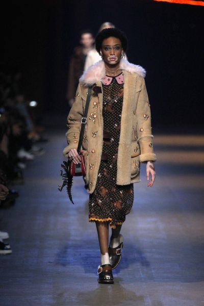 Winnie Harlow in a flower embellished shearling.