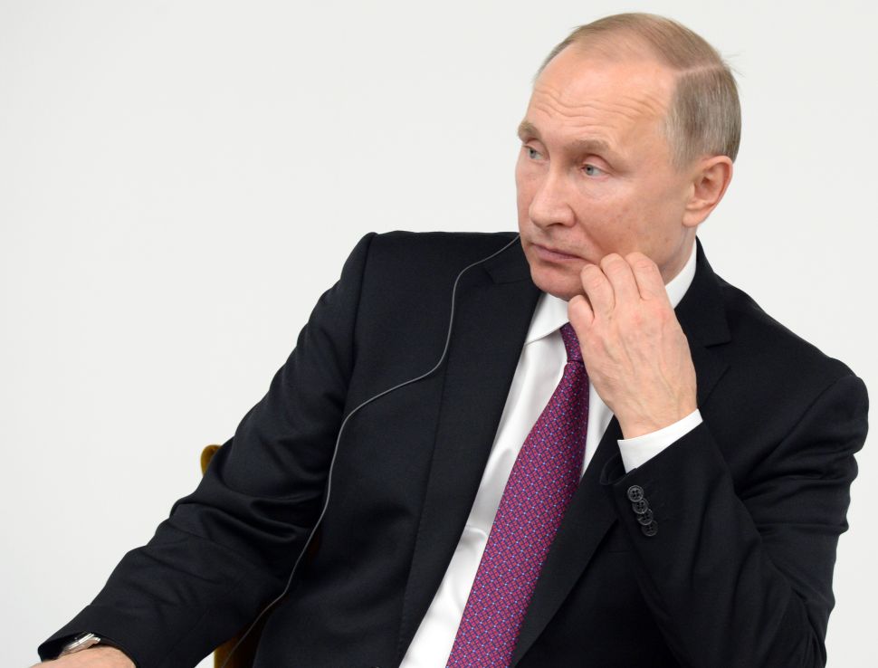 TOKYO, JAPAN - DECEMBER 16: Russian President Vladimir Putin attends a Japan-Russia business dialogue meeting at Keidanren Kaikan on December 16, 2016 in Tokyo, Japan. Putin is on a two-day official visit to Japan.