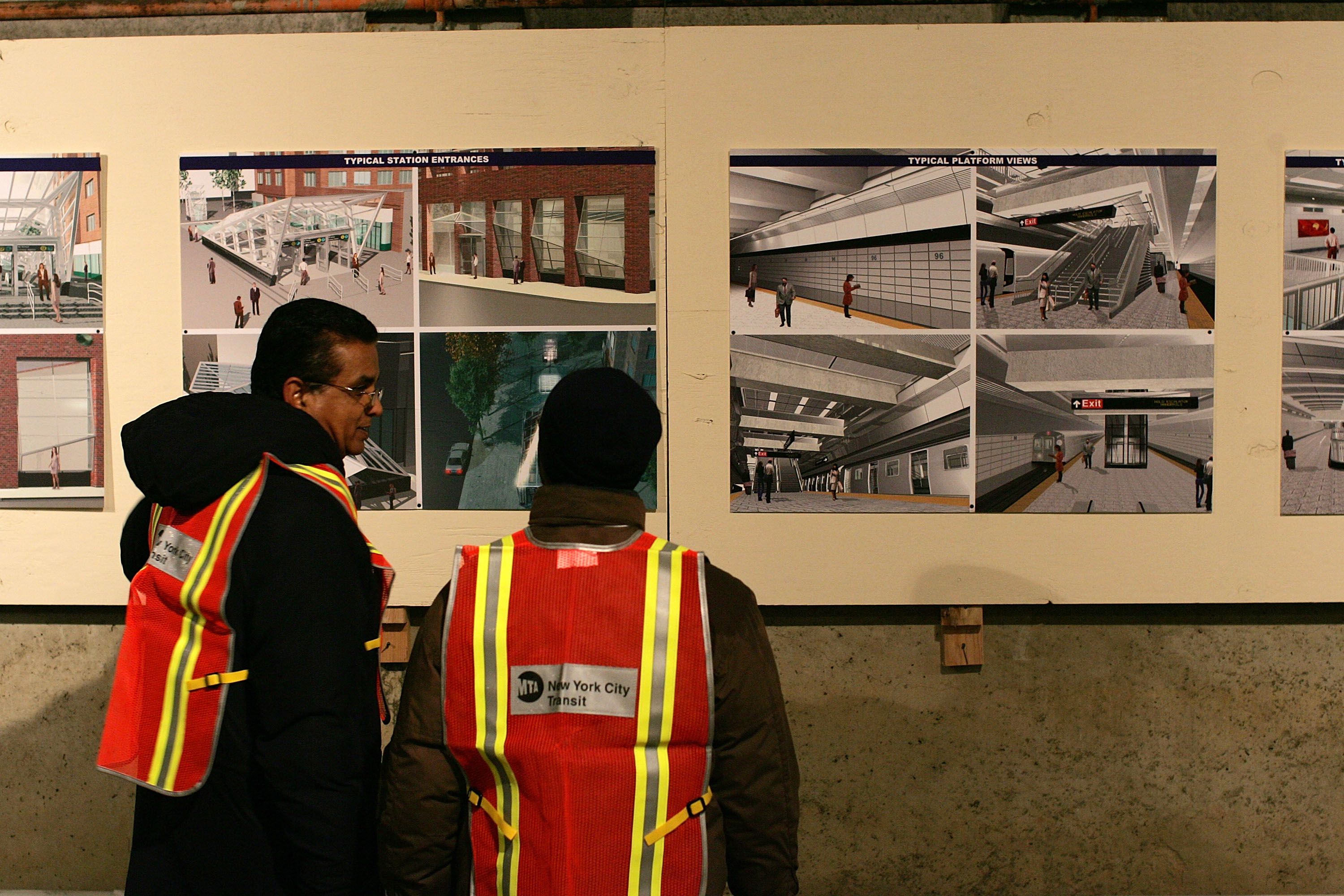 NEW YORK - APRIL 12: Metropolitan Transportation Authority (MTA) workers look at proposed designs for a completed subway platform in an underground tunnel for the long-proposed 2nd Avenue subway line April 12, 2007 in New York City. A groundbreaking ceremony was held for the line, one of numerous since the project was first proposed 80 years ago. The first phase of the line is scheduled to be completed in 2013, running from 96th Street to 63rd Street at a cost of $3.8 billion. Upon completion, line would add 8.5 miles of tracks and carry five million riders on weekdays in four of New York City's five boroughs.