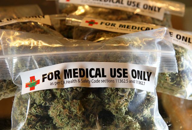 One-ounce bags of medicinal marijuana are displayed at the Berkeley Patients Group in 2010.