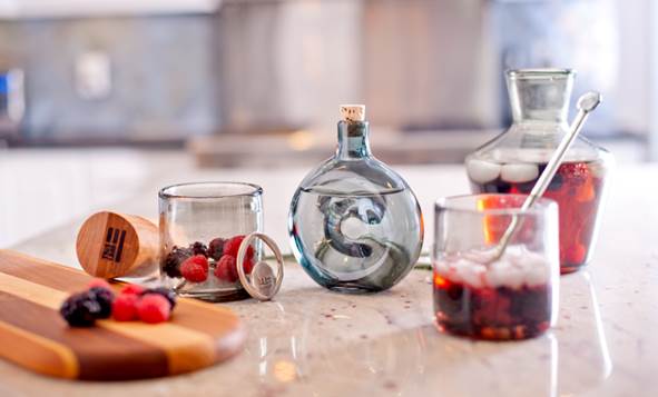 Blown glass flask by This Land.