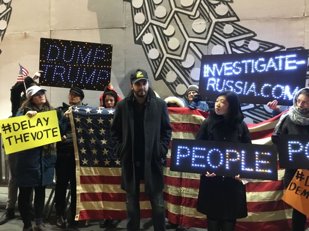Activists call on the Electoral College to delay their vote scheduled for Monday.
