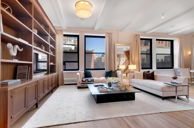 The pristine duplex is on the tenth and eleventh floors of Mercer House.