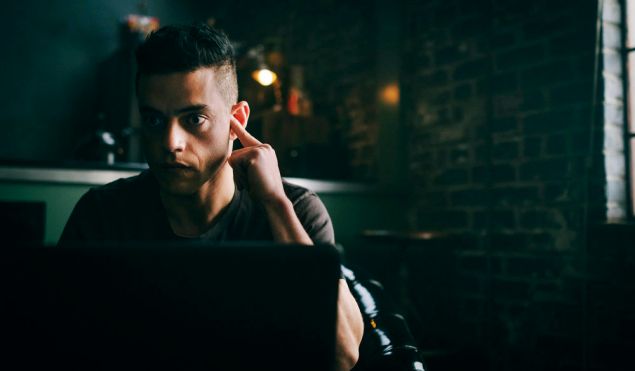 Rami Malek as Elliot Alderson.