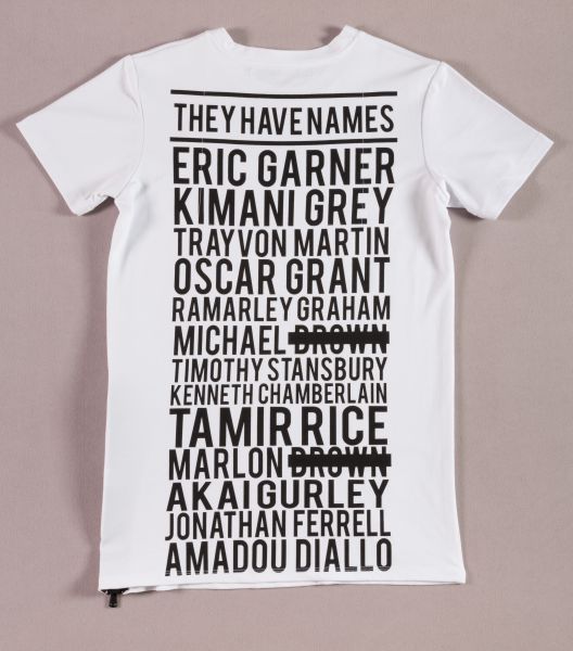They Have Names t-shirt in white stretch viscose with black printed names at back of 13 unarmed black men killed in police violence; SS zipper