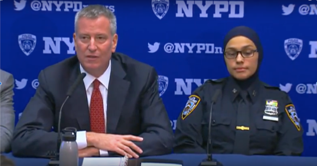 Mayor Bill de Blasio with Officer Aml Elsokary.