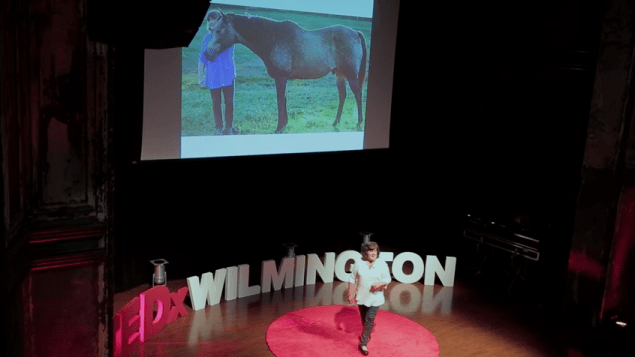 Tatz Chernoff givin a Ted Talk titled "How horses heal, transform, and empower" at TedX Wilmington.