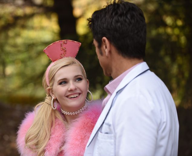 Abigail Breslin as Chanel #5 and John Stamos as Dr. Brock Holt.