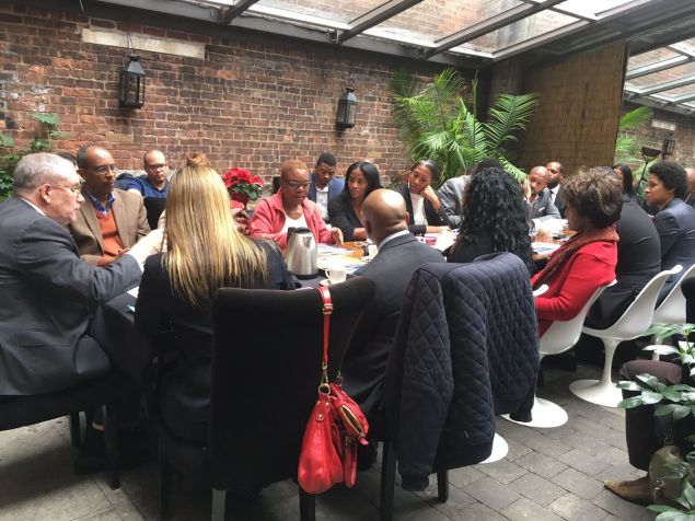 Comptroller Stringer addresses minority- and women-owned business leaders at a roundtable at Chéri Harlem.