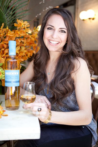 Allison Patel shows off her creation, Brenne Whiskey.