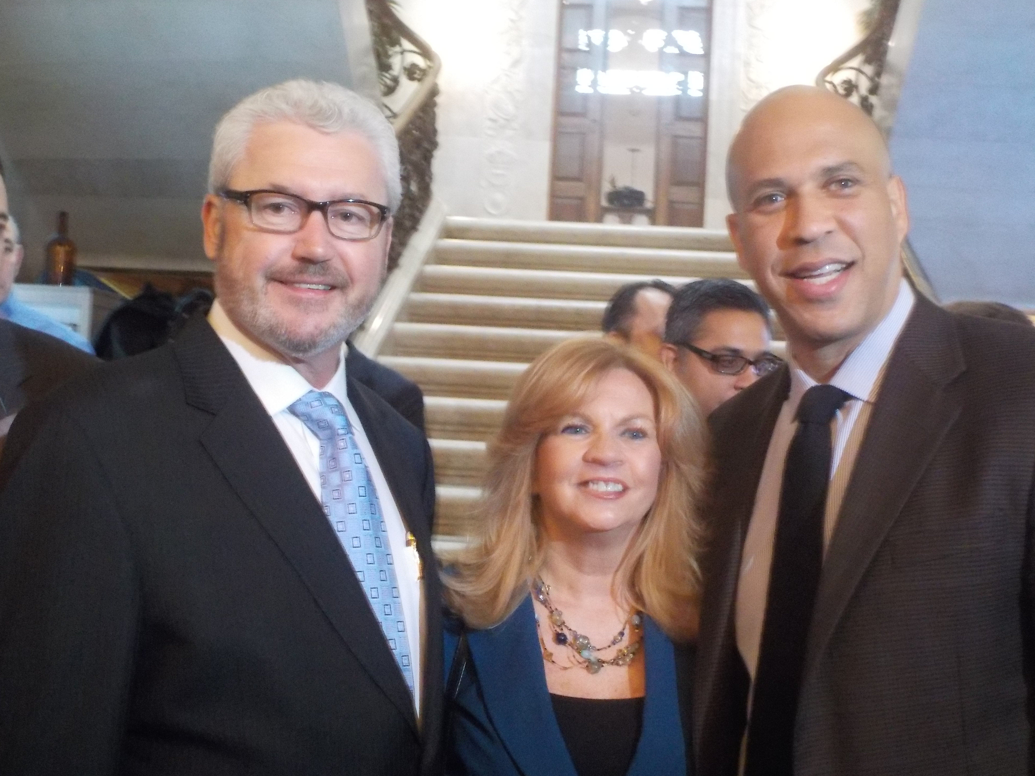 Morristown Mayor Tim Dougherty (left) announced his candidacy on Monday. Pictured with his wife, Mary, and U.S. Senator Cory Booker.