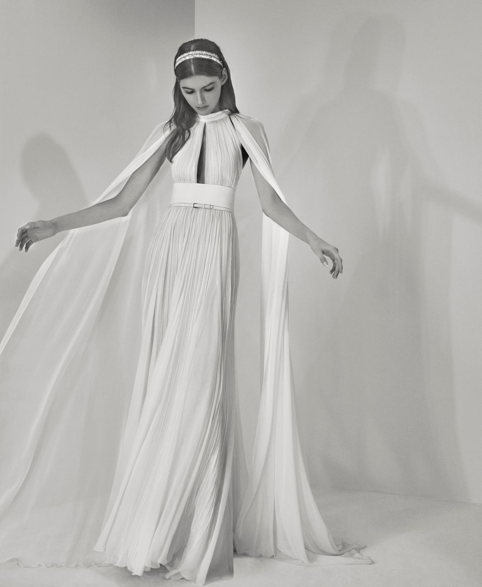 7 Wedding Gowns Inspired by History's Greatest Romances