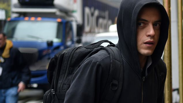 Rami Malek as Elliot Alderson.