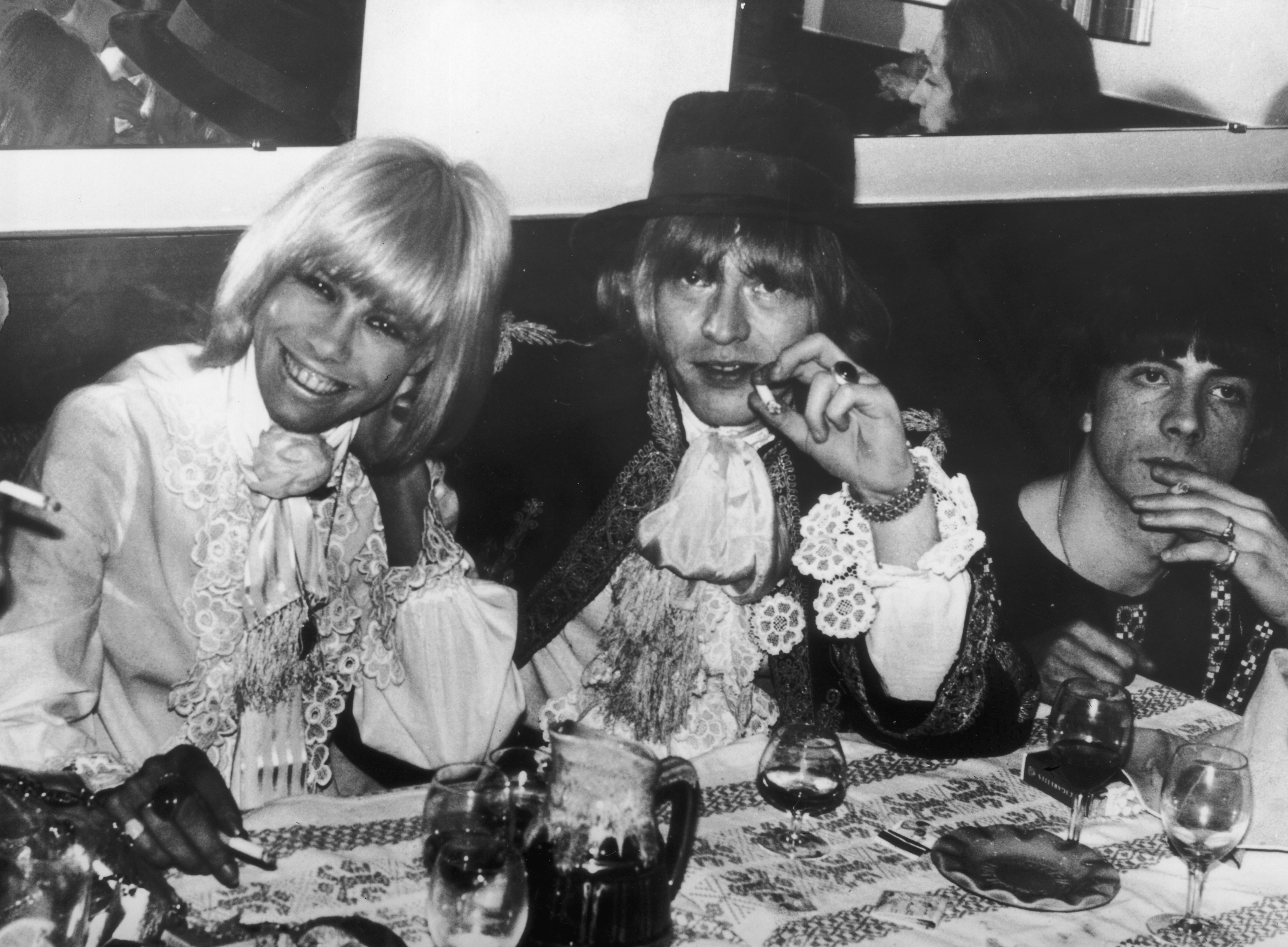 Anita Pallenberg and Brian Jones attending a party in Cannes during the film festival.