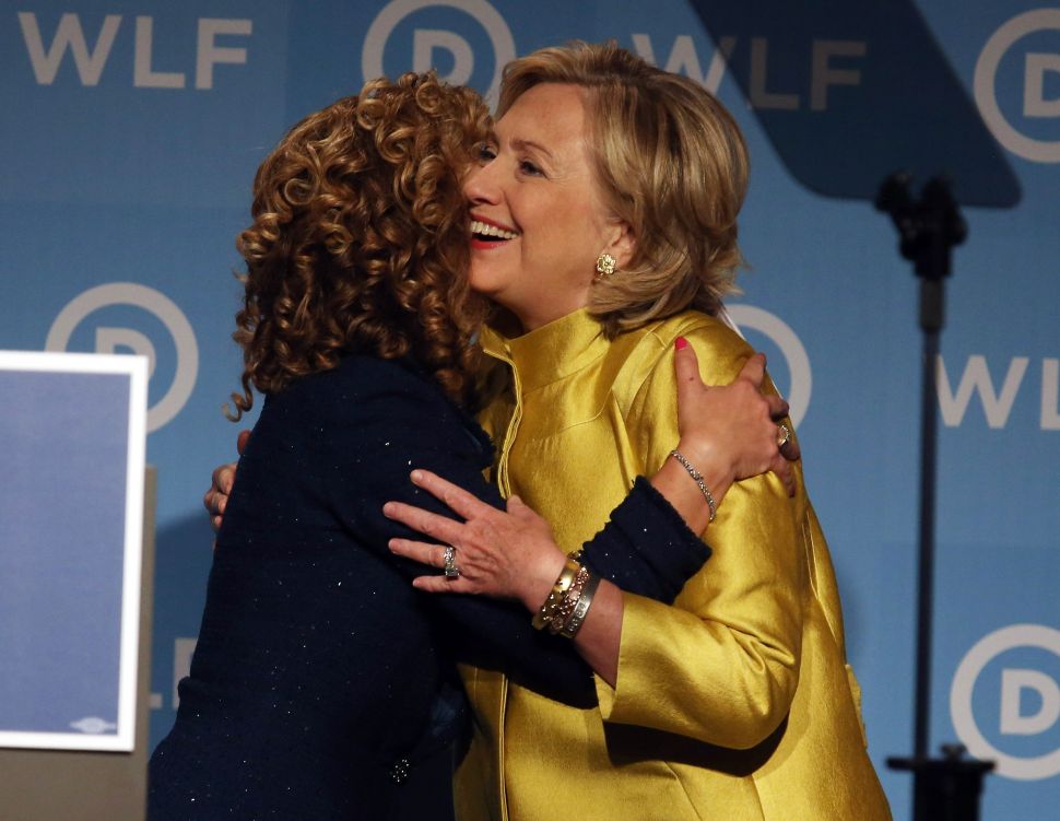 Hillary Clinton gets a hug from Rep. Debbie Wasserman Schultz.