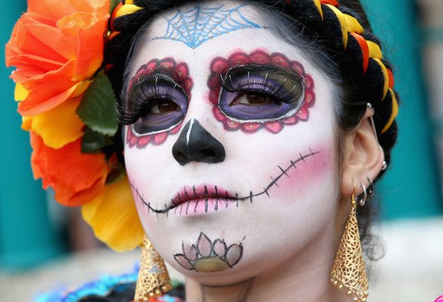 HIDALGO, MEXICO - NOVEMBER 02: A girl in costume in Real del Monte on the 'Day of the Dead' on November 2, 2014 in Hidalgo,Mexico. The Royal Couple are on the first day of a four day visit to Mexico as part of a Royal tour to Colombia and Mexico. (Photo by Chris Jackson/Getty Images)