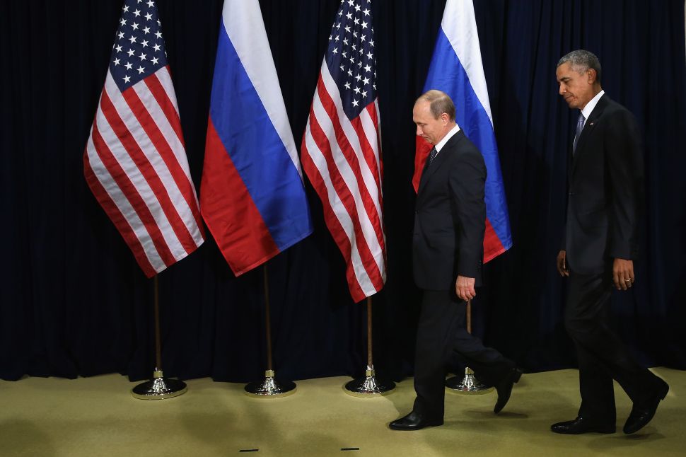 NEW YORK, NY - SEPTEMBER 28: (AFP OUT) Russian President Vladimir Putin (L) and U.S. President Barack Obama walk out for a photo-op before the start of a bilateral meeting at the United Nations headquarters September 28, 2015 in New York City. Putin and Obama are in New York City to attend the 70th anniversary general assembly meetings. (Photo by Chip Somodevilla/Getty Images)