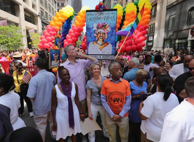 Mayor Mayor Bill de Blasio with wife Chirlane McCray, actress Cynthia Nixon and the Rev. Al Sharpton.