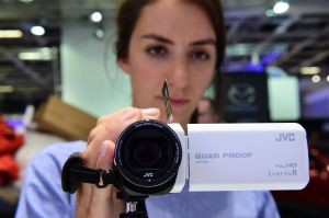 A quadproof camcorder is presented at the booth of JVC at the IFA (Internationale Funkausstellung) electronics trade fair in Berlin on September 1, 2016. The IFA is considered the worldwide biggest leading fair for entertainment electronics, IT and household appliances and opens its doors from September 2 till 7. / AFP / TOBIAS SCHWARZ