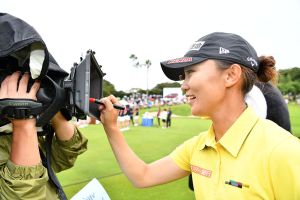 MIHAMA, JAPAN - SEPTEMBER 18: Teresa Lu of Taiwan signs an autograph on the TV camera after winning the during the Final round of the Munsingwear Ladies Tokai Classic 2016 at the Shin Minami Aichi Country Club Mihama Course on September 18, 2016 in Mihama, Japan. (Photo by Arrow Press/Getty Images)