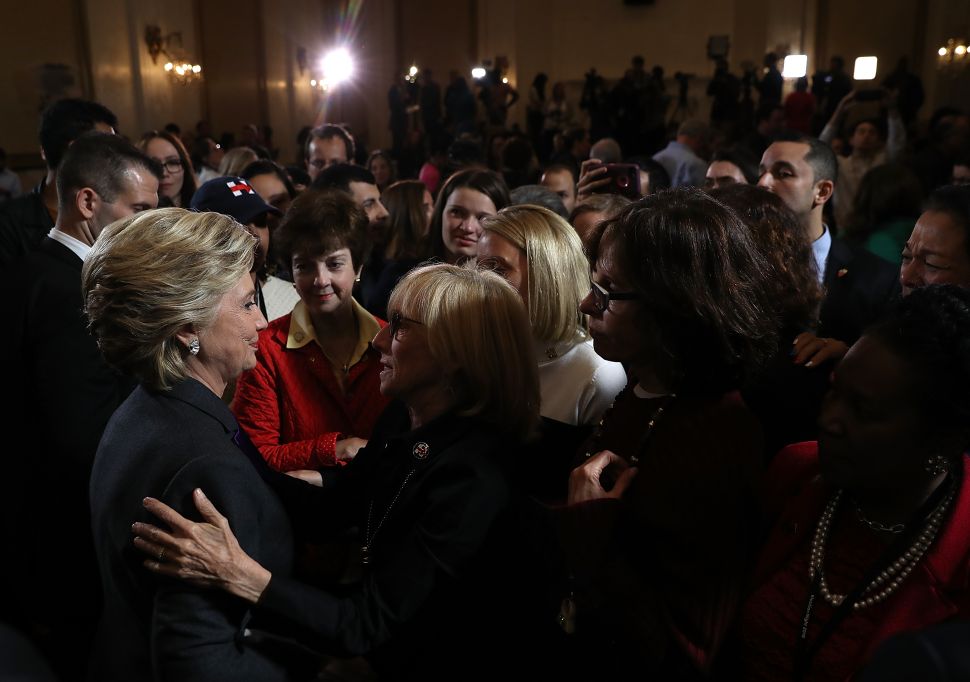 Former Secretary of State Hillary Clinton greets supporters and members of her staff after conceding the U.S. Presidency to Republican challenger Donald Trump.