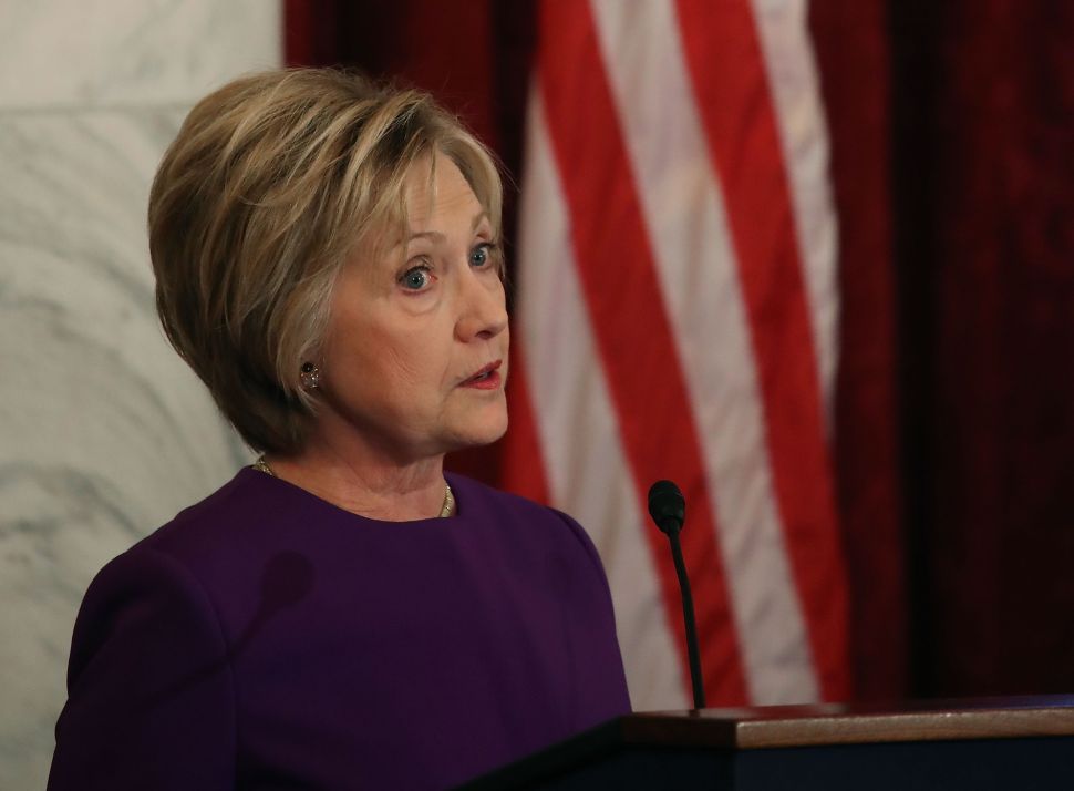 Former US Secretary of State Hillary Clinton speaks on Capitol Hill December 8, 2016 in Washington, DC.