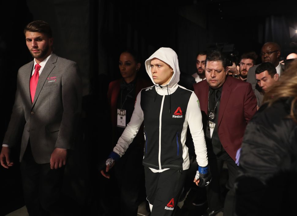 LAS VEGAS, NV - DECEMBER 30: Ronda Rousey walks to the Octagon to face Amanda Nunes of Brazil in their UFC women's bantamweight championship bout during the UFC 207 event on December 30, 2016 in Las Vegas, Nevada. (Photo by Christian Petersen/Getty Images)