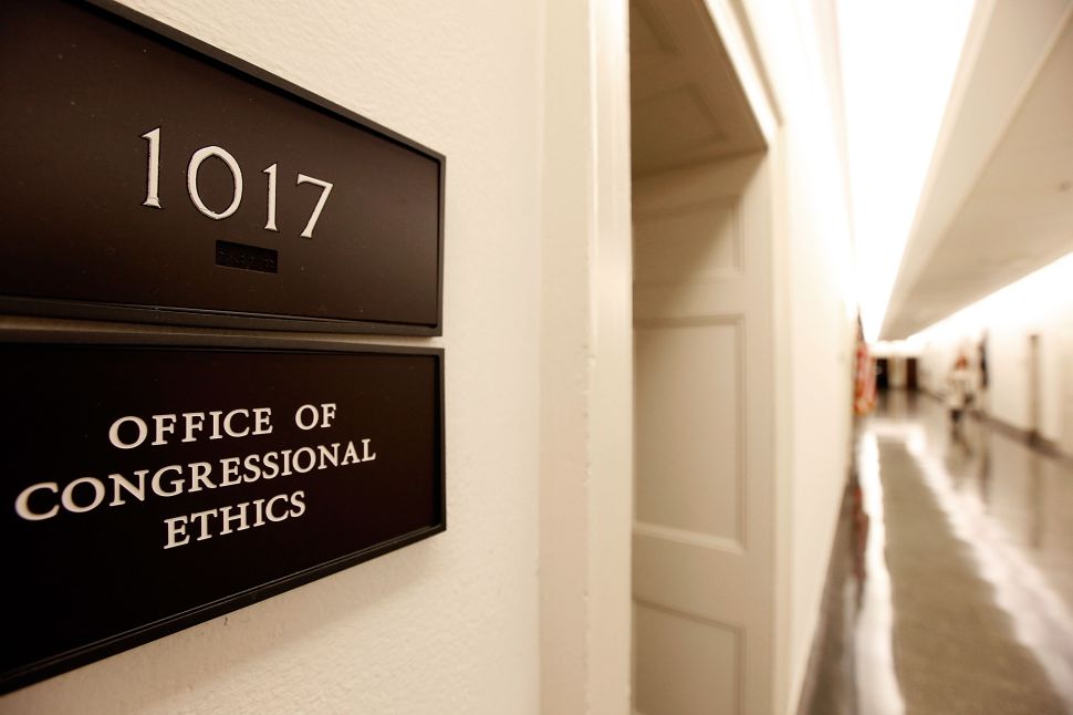 A sign for the Office of Congressional Ethics hangs on a wall October 30, 2009 in Washington, DC.