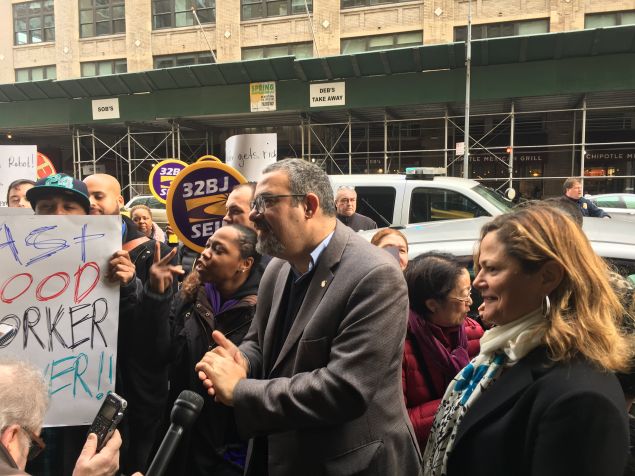 Hector Figueroa, president of 32BJ SEIU, and Council Speaker Melissa Mark-Viverito, blast Labor Secretary-designate Andrew Puzner's anti-worker actions in front of a Department of Labor office in Manhattan. 