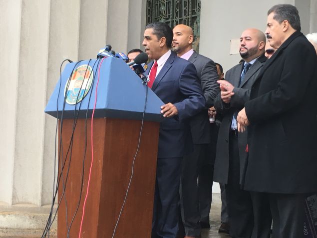 Congressman Adriano Espaillat speaks at a press conference against President Donald Trump's sanctuary city order on the steps of the Bronx County building.