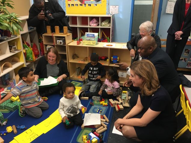 Deputy Mayor of Strategic Initiatives Richard Buery greets children at PS 171, where the city kicked off the pilot program for the NYC Child Savings Account for college.