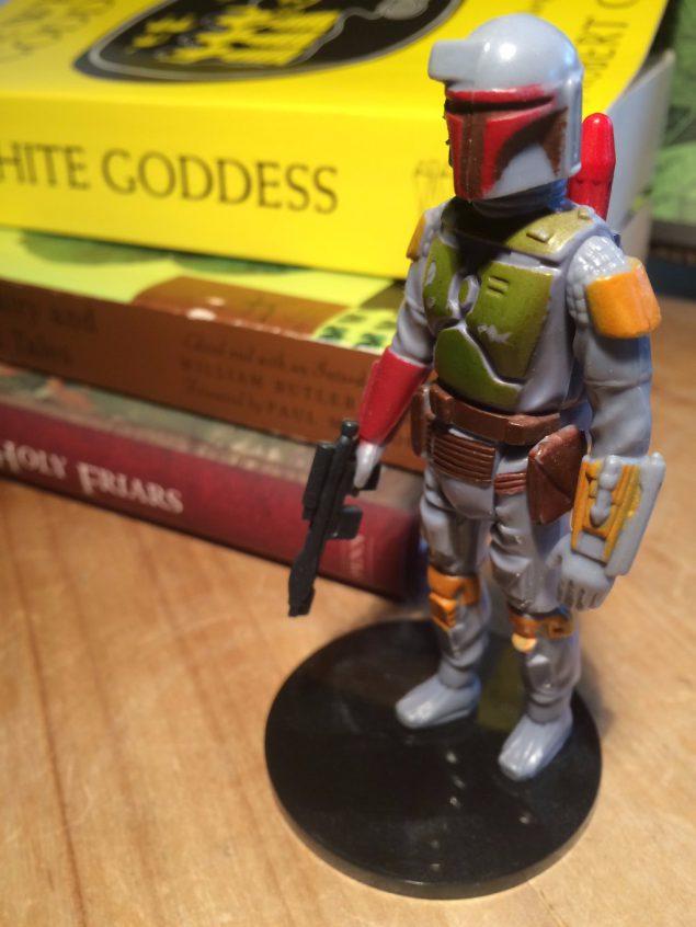 A Boba Fett action figure. Just standing there, like the real Boba Fett