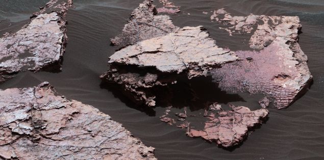 A network of cracks in a Martian rock slab called "Old Soaker." The view spans about 3 feet left-to-right and combines three images taken by the MAHLI camera on the arm of NASA's Curiosity Mars rover.
