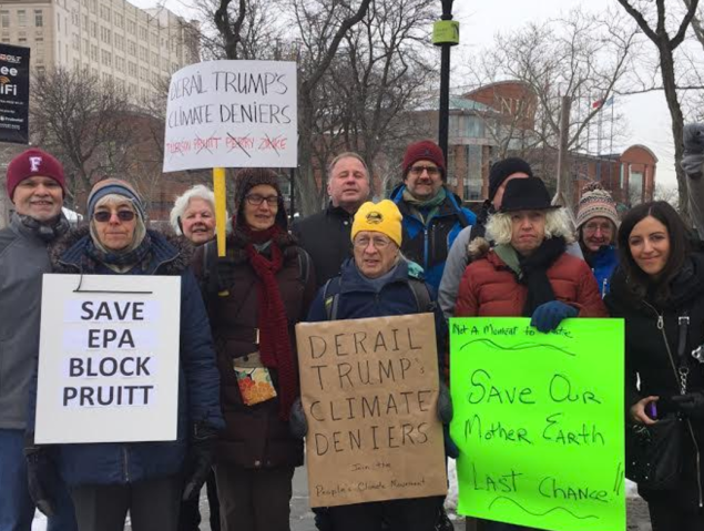 Demonstrators and environmental groups gathered Monday in Newark to protest president-elect Donald Trump's cabinet appointees.